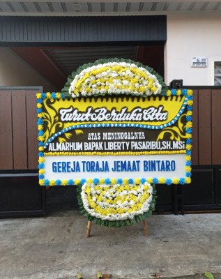 Papan Bunga Duka di Panarung